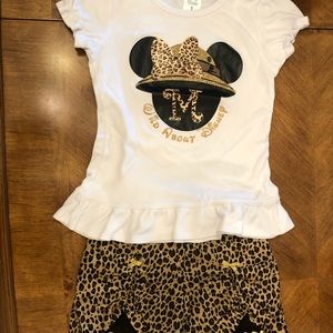 Disney size 8 animal print outfit.